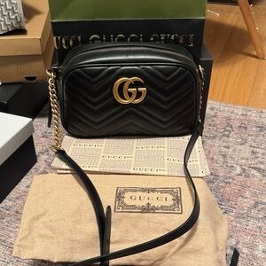 Gucci Black Quilted Crossbody Bag with Gold Accents